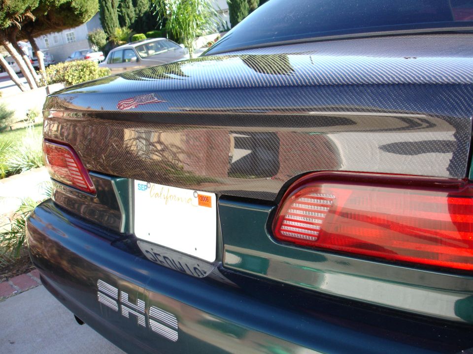 1993 Ford Taurus trunk with carbon fiber accent and California license plate