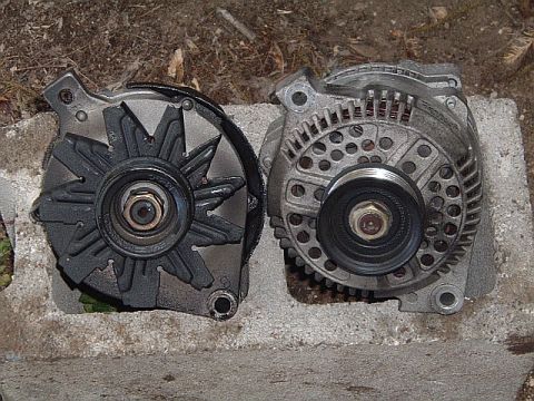 1994 Ford Thunderbird - here's the difference between the two alts, the wimpy early model 89-93 v6 70 amp alt is on the left, the better later model 94+ v6 130 amp…