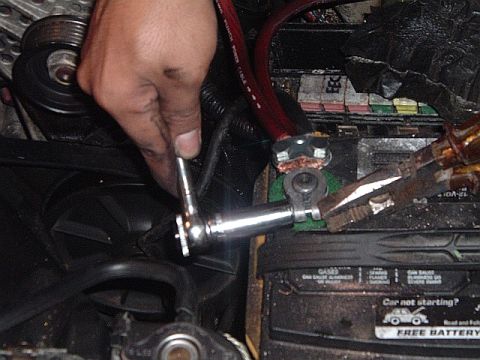 1994 Ford Thunderbird - tightening that new ground terminal.