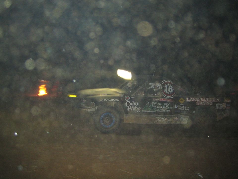 Dark off-road race truck numbered 16 with Cabo Wabo and Lake Elsinore Casino decals