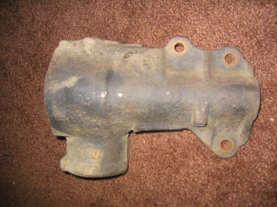 Old steering box, appears to be cast iron, with mounting holes