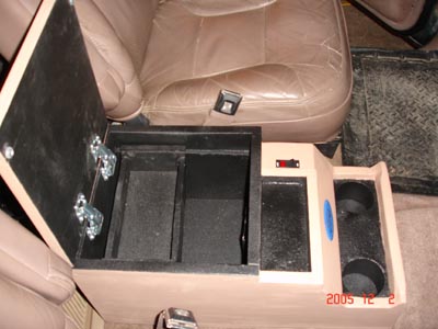 1995 Ford Bronco - Custom center console with storage and cup holders installed in a vehicle interior.