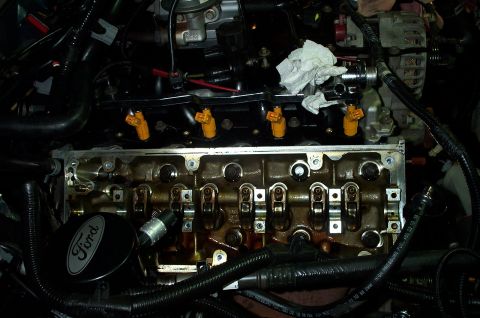 1998 Ford Crown Victoria - Close-up view of a Ford engine's internal components, including the valve train and fuel injectors.