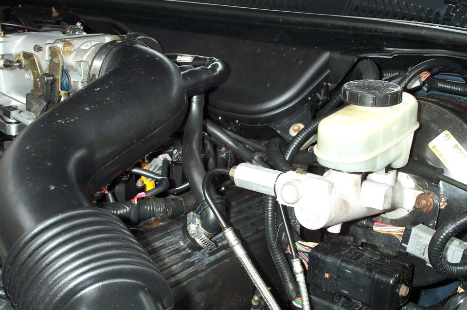 Note the modified tube. I used a HELP brand PCV elbow, part #47034.