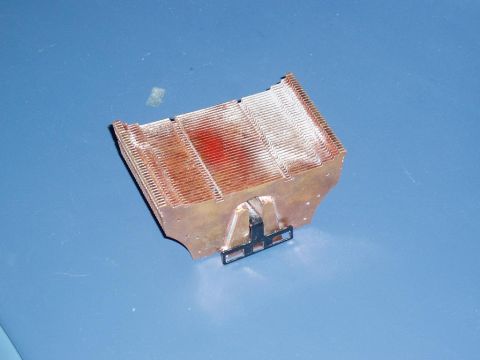 1989 Ford Bronco - A radiator part is shown against a blue background, with visible text from Supermotors.net.
