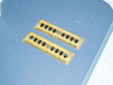 1989 Ford Bronco - Two computer RAM sticks are shown on a blue surface.