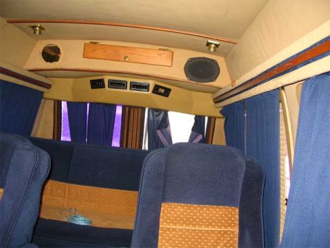 1986 Ford E150 - Another inside shot. Somebody pulled at some of the curtains and they fell down. Someone also broke my side door handle by being a dumbass…
