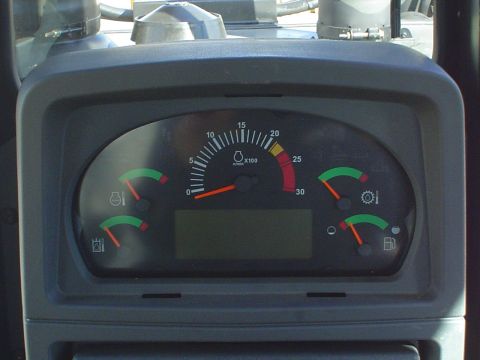 1966 International School Bus - The dashboard displays various gauges and a digital screen, indicating operational status.