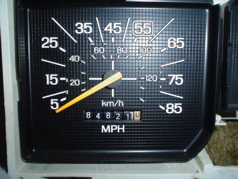 1984 Ford Bronco - The vehicle's speedometer and odometer are visible, with the needle pointing to 55 mph.