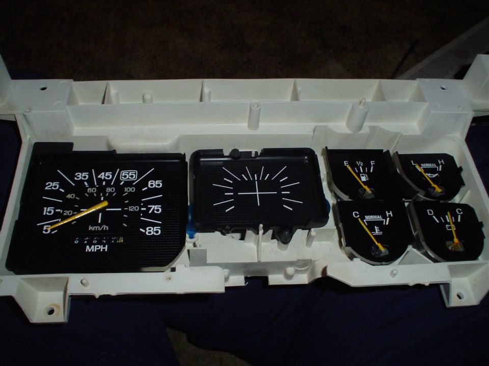 1984 Ford Bronco dashboard gauges with speedometer, fuel, oil, and temperature gauges