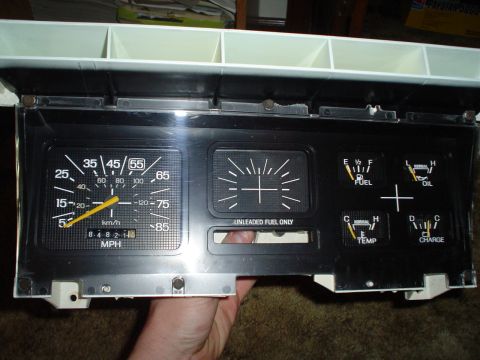 1984 Ford Bronco - Instrument cluster showing speedometer, fuel, oil, temperature, and charge gauges.