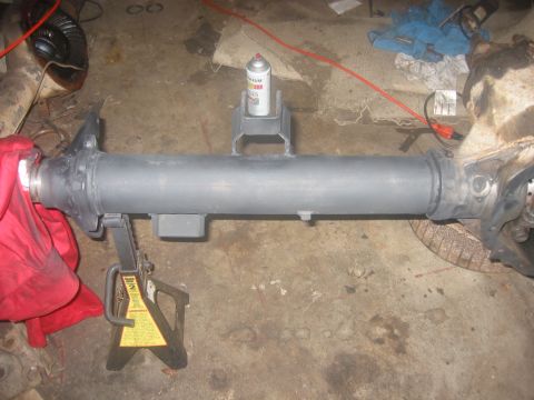 1989 Ford Bronco - Half of the axle with primer on it.