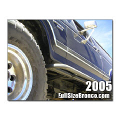 1985 Ford Bronco - This photo highlights the side profile of a Ford Bronco, text overlays with website information and the year 2005.