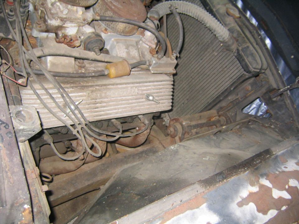 1956 Ford Thunderbird engine bay with V8 engine and radiator
