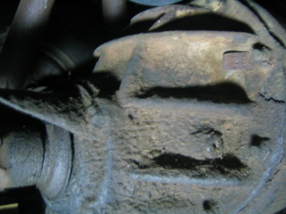Close-up of a dirty vehicle differential housing