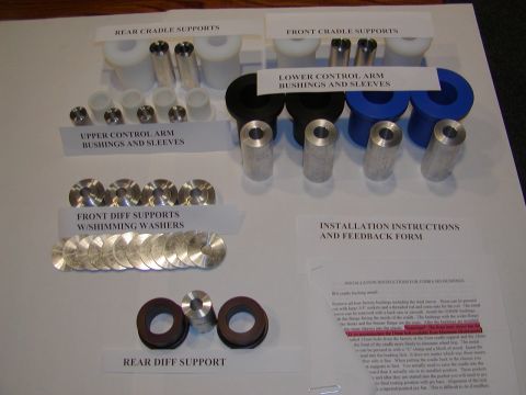 2000 Ford Mustang - Various automotive suspension components are laid out with labels and installation instructions.