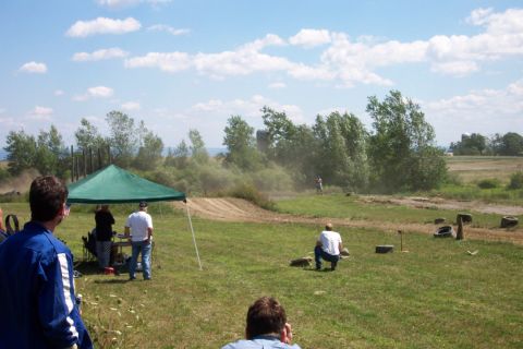1979 Ford F-150 - Spectators gather to watch an off-road race event on a sunny day.