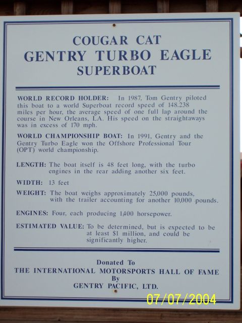 1987 Ford Bronco - This sign details the achievements of the Cougar Cat Gentry Turbo Eagle Superboat, including its world record speed.