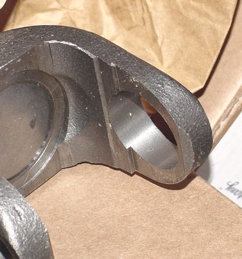 1990 Ford Bronco - Close-up view of a metal automotive part, likely a component for a drivetrain or suspension system.