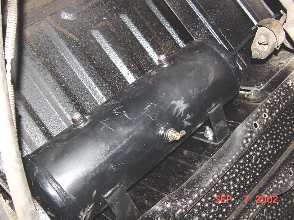 Air tank (2 gal.); installed on floor angle under rear seat.