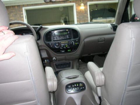 1995 Ford Bronco - The interior of a 2006 Toyota Sequoia is shown from the perspective of the passenger seat.