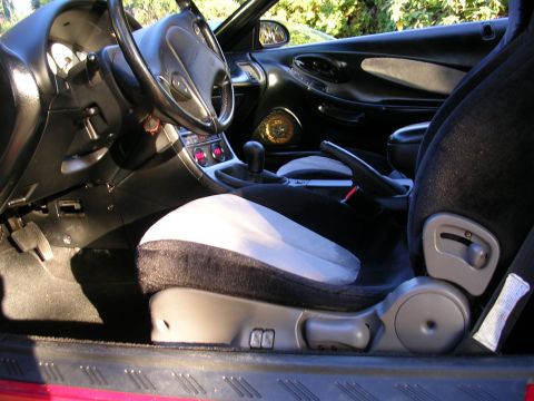 1996 Ford Probe - Interior view of a 1996 Ford Probe, highlighting the driver's side seat and dashboard.