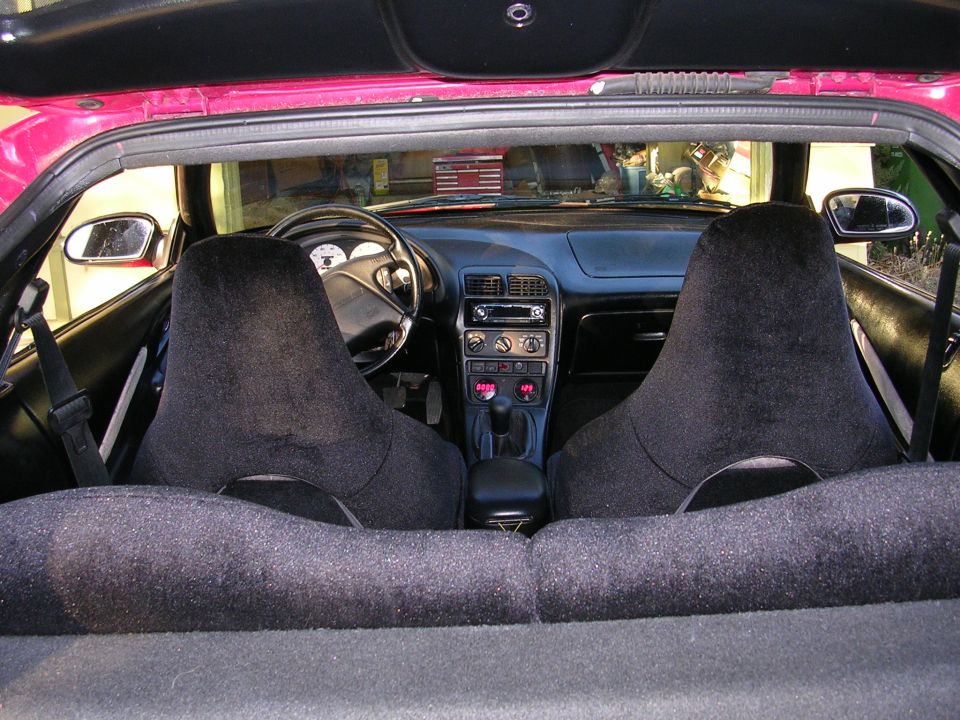 Interior of a 1996 Ford Probe showing dashboard and seats