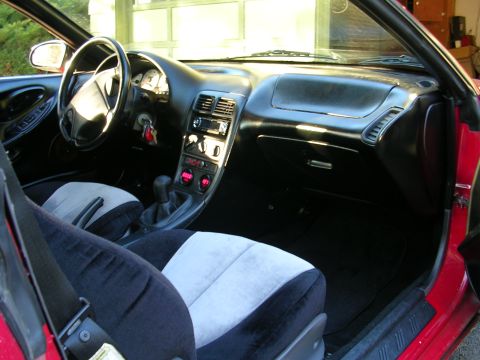 1996 Ford Probe - Interior view of a 1996 Ford Probe, highlighting the dashboard and seating.