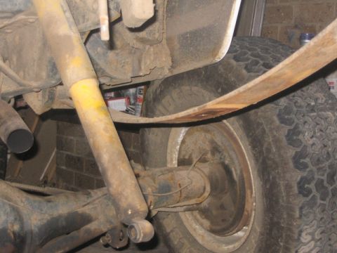 1981 Ford Bronco - Rear axle and leaf spring detail, showing wear and tear.