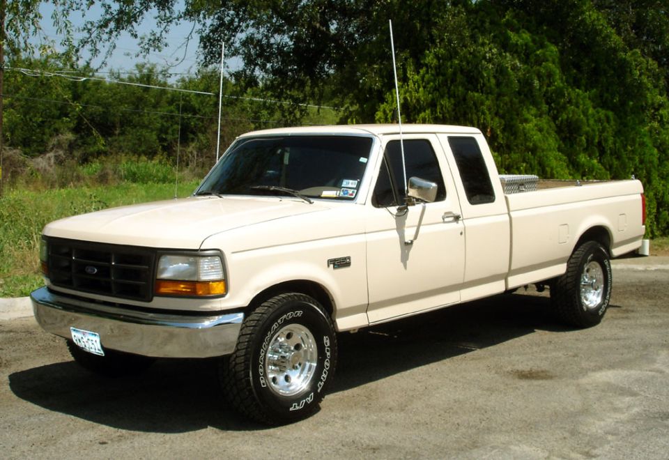 Cream-colored 1993 Ford F-250 pickup truck parked outdoors