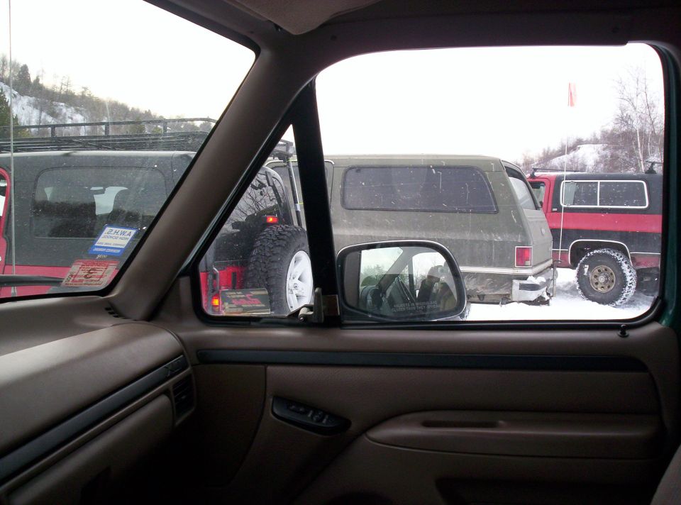 Interior view of parked SUVs in snow