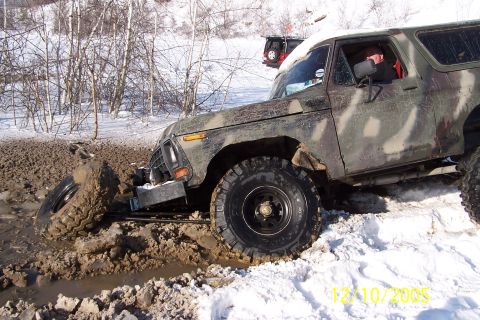 1979 Ford Bronco - This 1978 Ford Bronco is stuck in a muddy and snowy off-road situation.