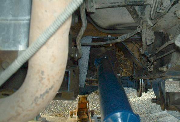 1986 Ford Bronco underbody view of exhaust pipe and suspension
