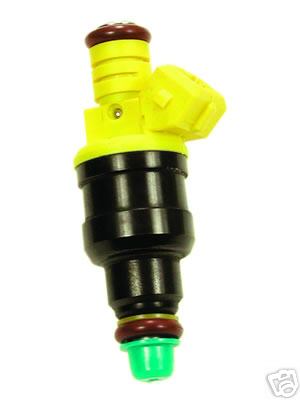 1992 Ford Probe - A yellow and black fuel injector with green and red seals is shown against a white background. Text from the original image reads "SUPERMOT…