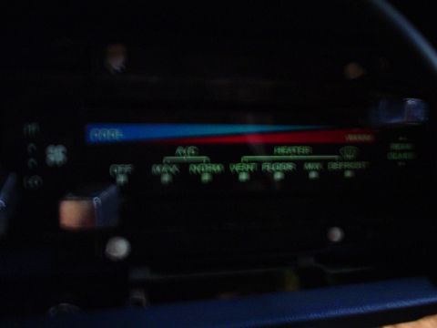 1984 Ford Bronco - Interior climate control panel shows temperature settings and air distribution options.