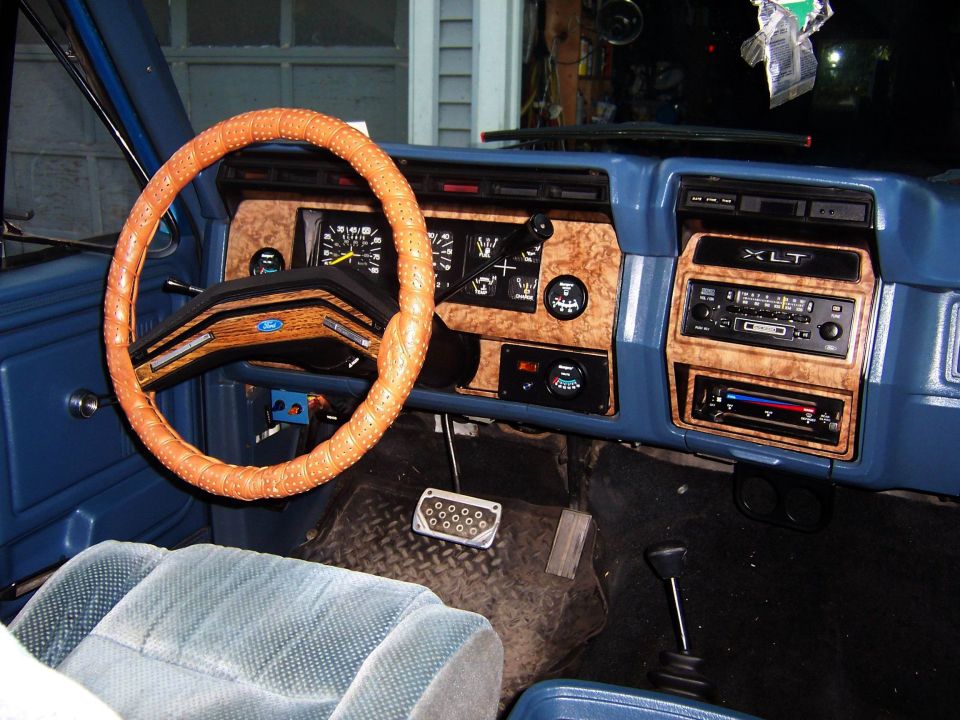 Added real volt meter, wet Oil Pressure, Vacuum and Temperature gauges. Clock, radio and bezel from a 1985 Broco. Dash from a 1984 F150.