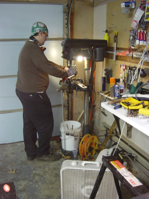 1991 Ford Bronco - JB drilling the end plates.