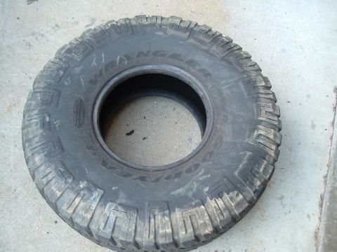 1989 Ford Bronco - A single Goodyear Wrangler tire is shown, likely for off-road use.