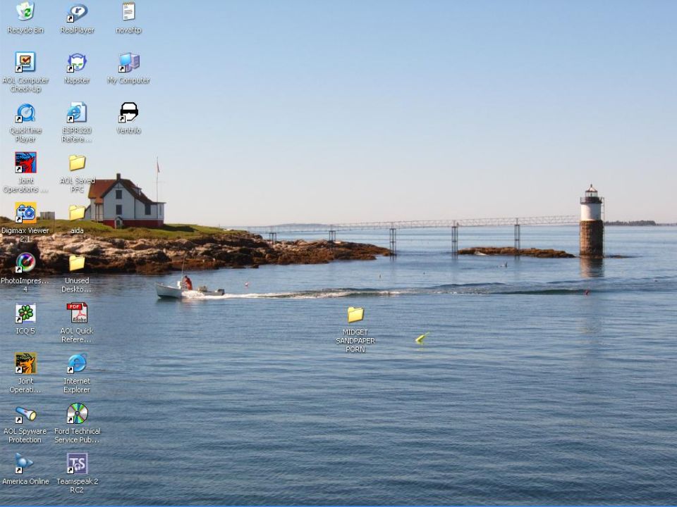 Desktop screenshot of a lighthouse and a boat on the water