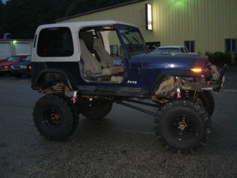 1995 Jeep YJ - Wee hours of the morning after we drove it into town. Now just to fix those old wheel cylinders and try to balance those boggers.