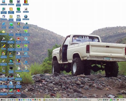 1981 Ford F-150 - A lifted Ford pickup truck is seen from the rear on a rocky, outdoor landscape.