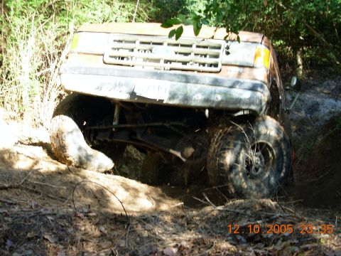 1987 Ford Bronco - This 1987 Ford Bronco is stuck off-road in the mud.