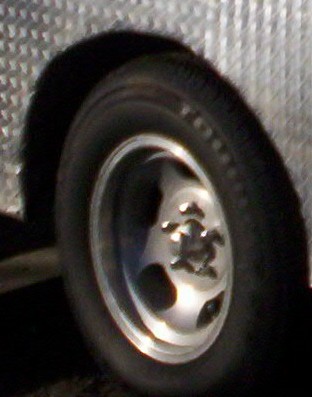 1988 Ford Bronco II - A close-up view of a vehicle's wheel and tire, with a watermark at the bottom.