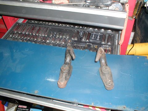 1979 Ford Bronco - Two tow hooks are shown in a toolbox, not a 1979 Ford Bronco.