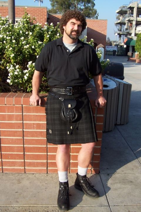 1990 Ford Bronco - A man poses for a photo while wearing traditional Scottish attire.
