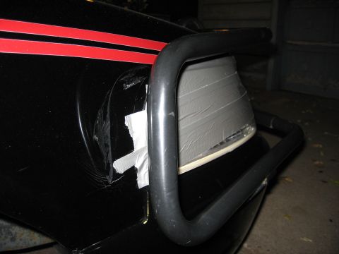 2000 Ford Crown Victoria - This vehicle has a damaged taillight that has been crudely repaired with duct tape.
