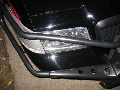 2000 Ford Crown Victoria - Front view of a black 2000 Ford Crown Victoria equipped with a heavy-duty bull bar.