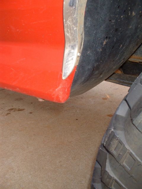 1995 Ford F-150 - Leading edge of the rear wheel opening. This shows where an inch and a half of the sheetmetal was cut and rolled in. The trim piece still f…