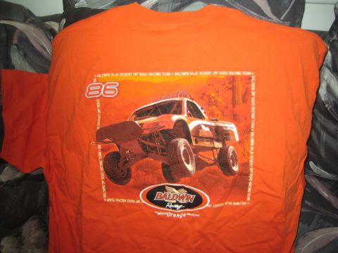 Orange Baldwin Racing T-shirt printed with an off-road race truck and number 86