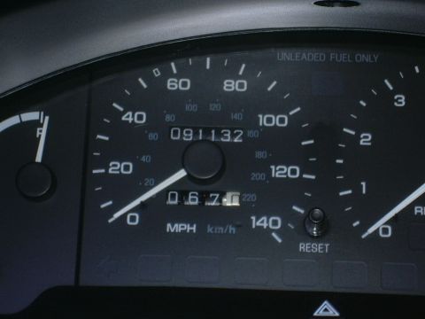 1997 Ford Probe - The vehicle's odometer displays 91,132 miles, with the speedometer needle resting at zero.